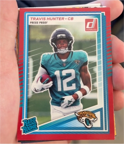 2025 Panini Donruss #301 Travis Hunter Rated Rookie Press Proof — front