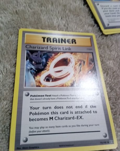 2016 Pokémon XY Evolutions #75 Charizard Spirit Link — front