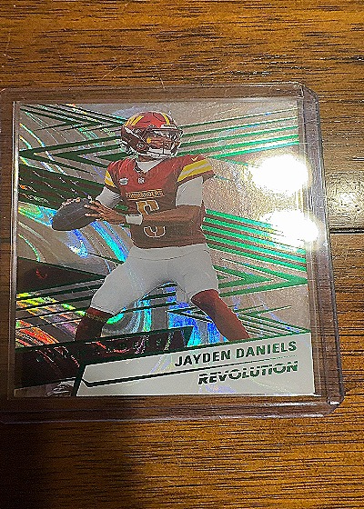 2025 Panini Revolution #1 Jayden Daniels — front