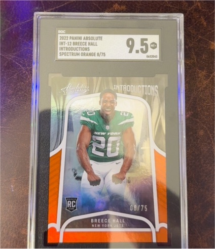 2022 Panini Absolute Introductions #INT-12 Breece Hall Spectrum Orange — front