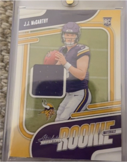 2024 Panini Absolute Rookie Materials #ARM-JMY J.J. McCarthy — front