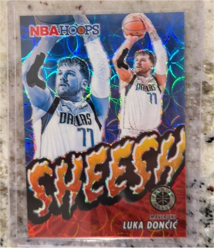 2023-24 Panini NBA Hoops Premium Stock #16 Luka Doncic Sheesh — front