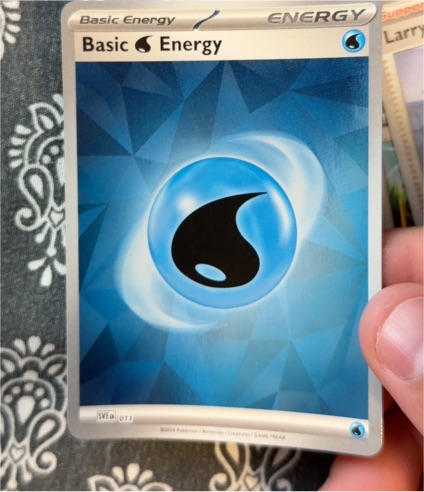 2024 Pokémon TCG Scarlet & Violet Prismatic Evolutions #011 Basic Water Energy — front