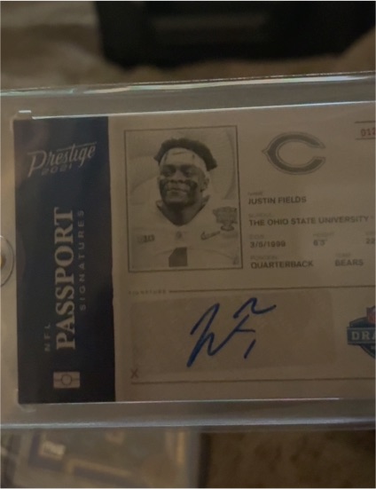 2021 Panini Prestige NFL Passport Signatures #SM1 Justin Fields — front