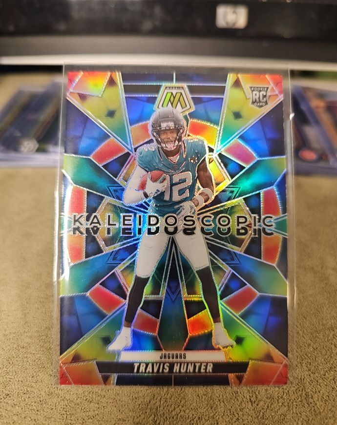 2025 Panini Mosaic #12 Travis Hunter Kaleidoscopic Rookie — front