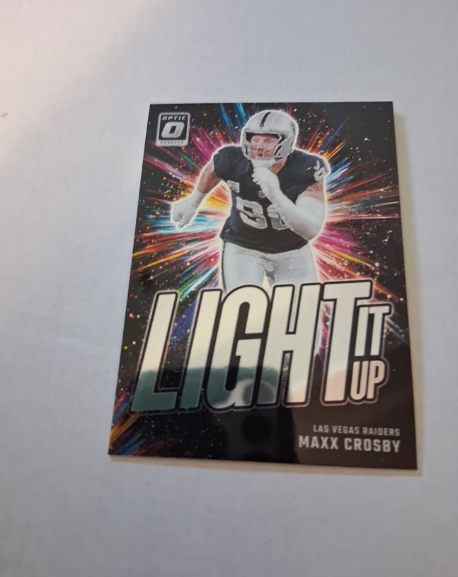 2024 Panini Donruss Optic #12 Maxx Crosby Light It Up — front
