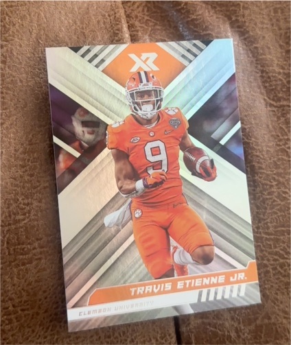 2023 Panini Chronicles Draft Picks #19 Travis Etienne Jr. XR — front