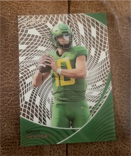 2023 Panini Chronicles Draft Picks Clear Vision #25 Justin Herbert — front