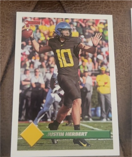2023 Panini Chronicles Draft Picks Donruss Retro #4 Justin Herbert — front