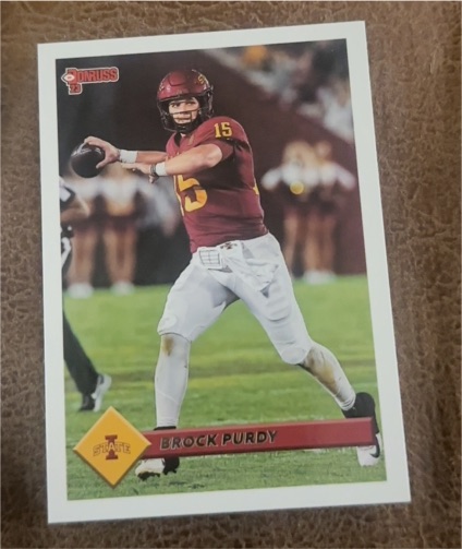 2023 Panini Chronicles Draft Picks - Donruss Retro #13 Brock Purdy — front