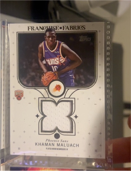 2025-26 Topps Franchise Fabrics #FF-KM Khaman Maluach — front