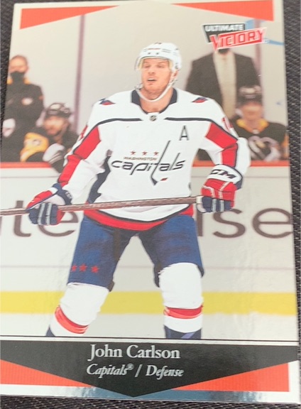 2020-21 Upper Deck Extended Series Ultimate Victory #UV-13 John Carlson — front