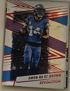 2025 Panini Revolution #180 Amon-Ra St. Brown — front