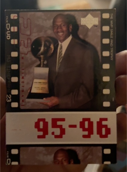 1998-99 Upper Deck Michael Jordan Timeframe The MVP Smile And Trophy #93 — front