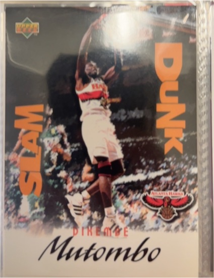 1997 Upper Deck Nestle Slam Dunk #SD3 Dikembe Mutombo — front