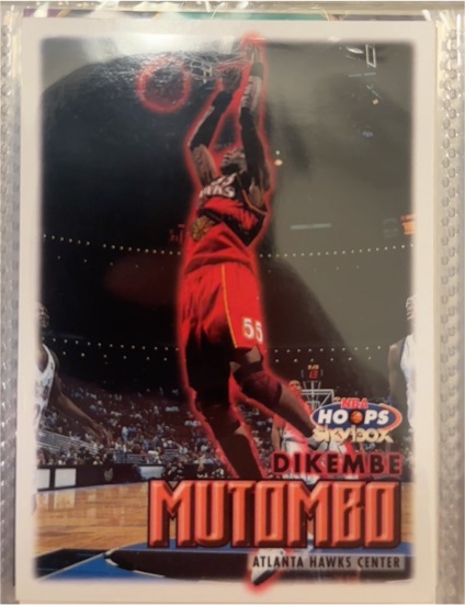 1999-00 Skybox Hoops #113 Dikembe Mutombo — front