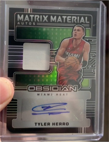 2024-25 Panini Obsidian Matrix Material Autograph Patch Tyler Herro #MM-HRO — front