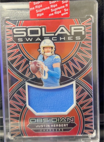 2024 Panini Obsidian Solar Swatches #21 Justin Herbert — front
