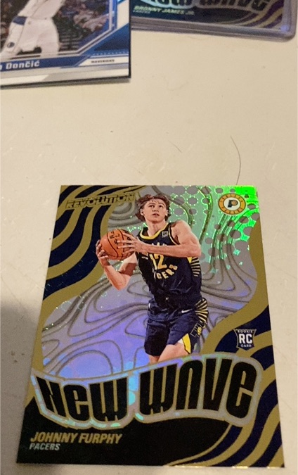 2024-25 Panini Revolution #1 Johnny Furphy New Wave Rookie Card — front