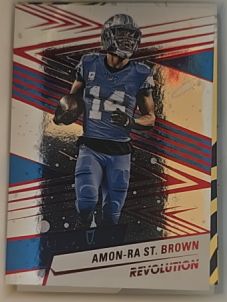 2025 Panini Revolution #180 Amon-Ra St. Brown — front