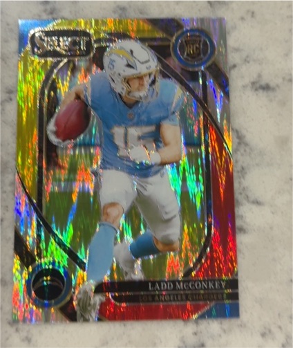 2024 Panini Select #268 Ladd McConkey Club Level Red & Yellow Shock Prizm Rookie Card — front