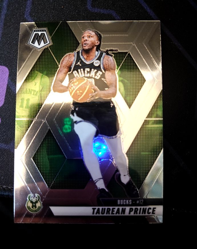 2024-25 Panini Mosaic #12 Taurean Prince — front