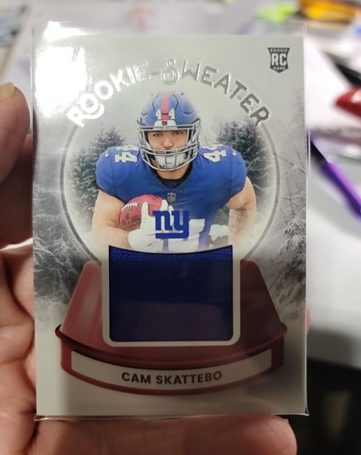 2025 Panini Donruss #SWE-CSK Cam Skattebo Rookie Sweater — front