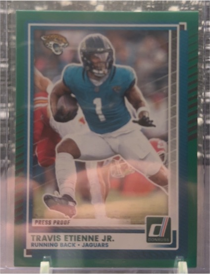 2025 Donruss #141 Travis Etienne Jr. Press Proof Green — front