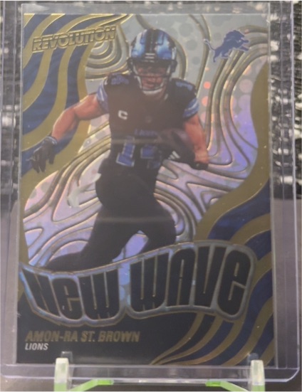 2025 Panini Revolution #20 Amon-Ra St. Brown New Wave — front
