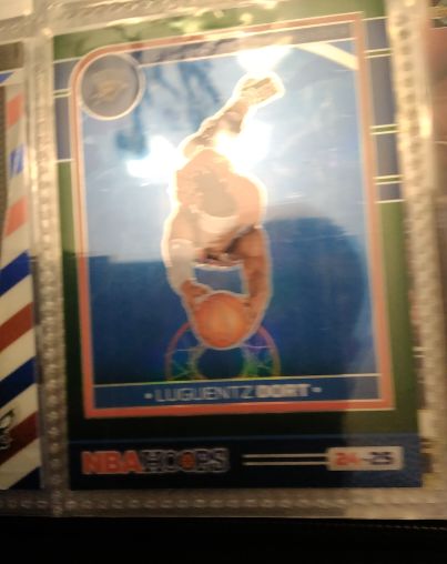 2024-25 Panini NBA Hoops #219 Luguentz Dort — front