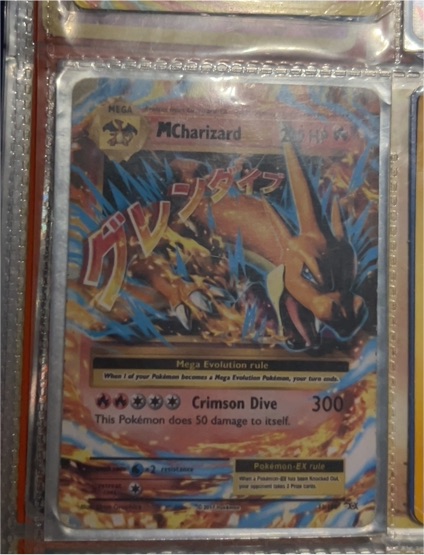 2016 Pokémon M Charizard EX #13/108 Evolutions — front