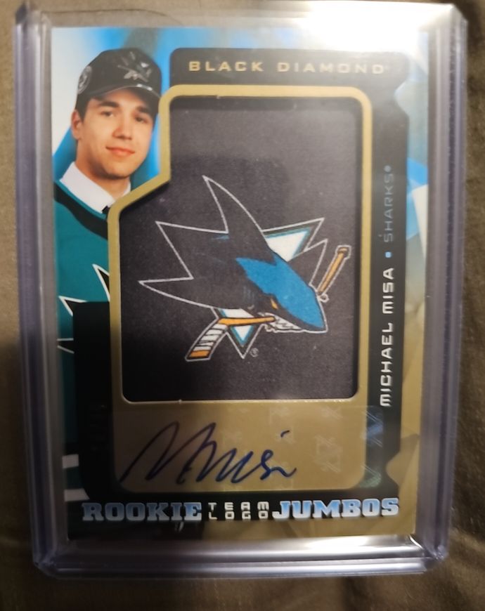 2025-26 Upper Deck Black Diamond Rookie Team Logo Jumbos #Michael Misa — front