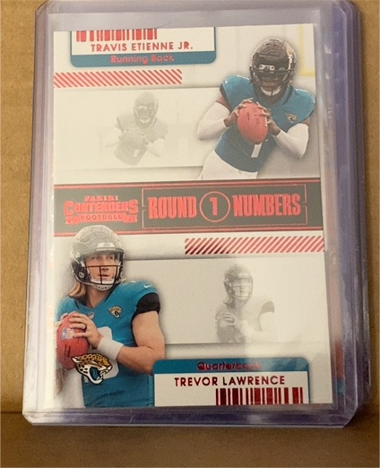 2021 Panini Contenders #RN-TET Trevor Lawrence / Travis Etienne Jr. Round 1 Numbers — front
