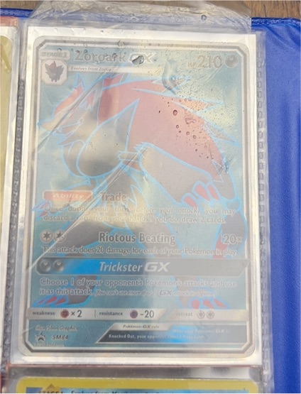 Pokémon TCG Sun & Moon Black Star Promo SM84 Zoroark GX — front