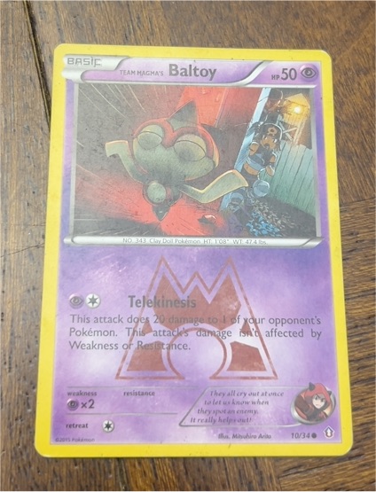 2015 Pokémon Double Crisis #10 Team Magma's Baltoy — front