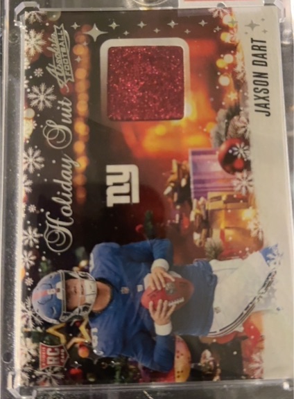 2025 Panini Absolute #HS-JDT Jaxson Dart Holiday Suit Rookie Relic — front