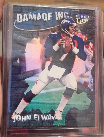 1999 Fleer Ultra #3DI John Elway Damage, Inc. — front
