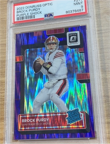 2022 Donruss Optic #277 Brock Purdy Purple Shock Rated Rookie — front