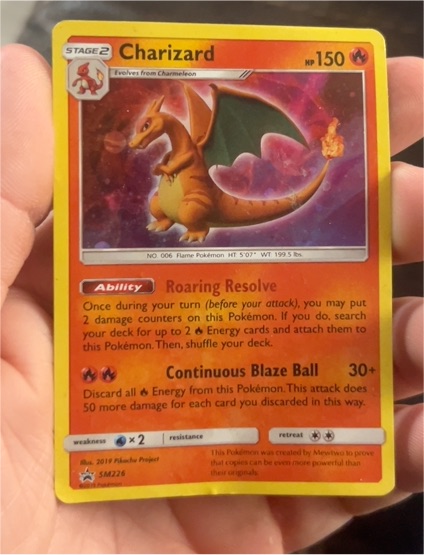2019 Pokemon SM226 Charizard Black Star Promo — front