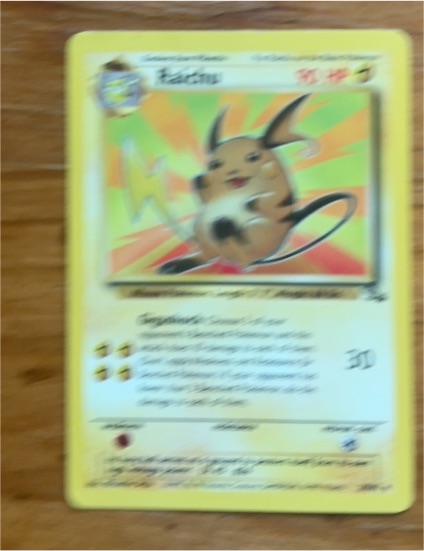 1999 Pokémon Fossil #29 Raichu — front