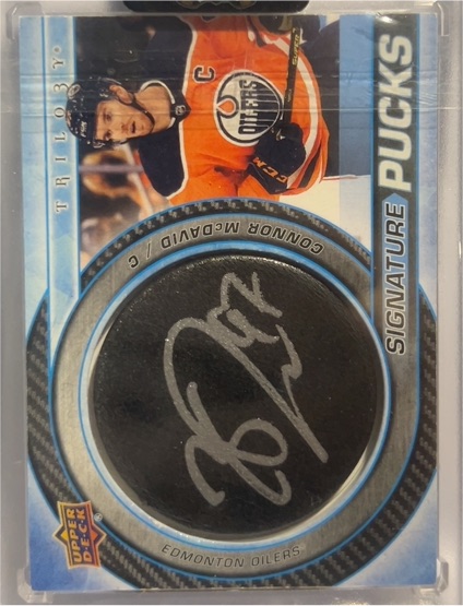2022-23 Upper Deck Trilogy Signature Pucks #SP-CM Connor McDavid — front