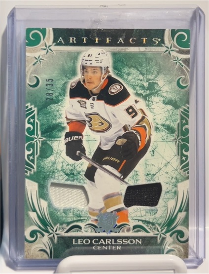 2024-25 Upper Deck Artifacts Emerald Materials #20 Leo Carlsson — front