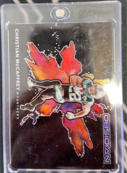 2021 Panini Obsidian Color Blast Black #CB19 Christian McCaffrey — front