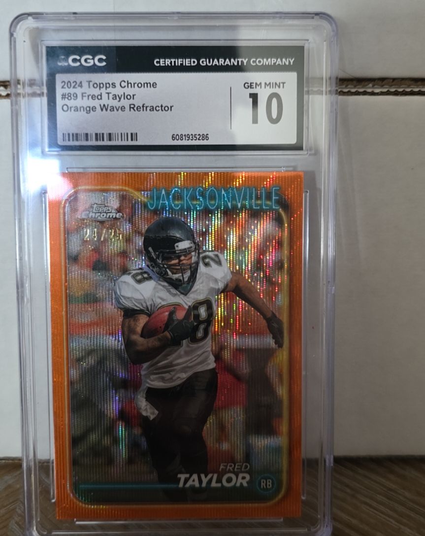 2024 Topps Chrome #89 Fred Taylor Orange Wave Refractor — front