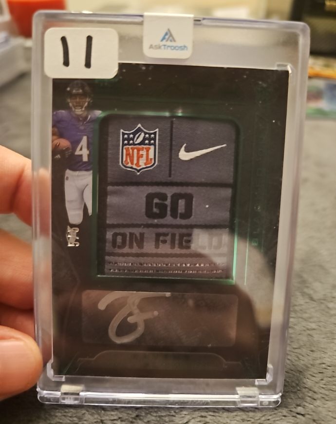 2022 Panini National Treasures Football Justin Fields Patch Laundry Tag 1/1 — front