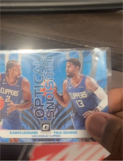 2022-23 Donruss Optic #4 Optical Illusions Kawhi Leonard/Paul George — front