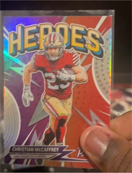 2023 Panini Prestige #H-9 Christian McCaffrey Heroes — front