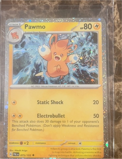 2023 Pokémon Paldea Evolved #075 Pawmo Cosmos Holo Promo — front