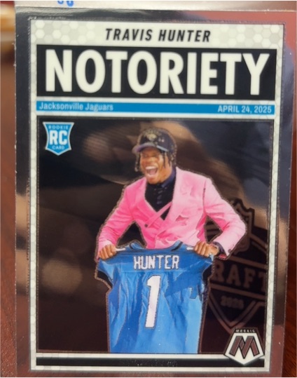 2025 Panini Mosaic #12 Travis Hunter Notoriety — front