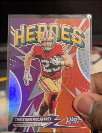 2023 Panini Prestige Heroes #H-9 Christian McCaffrey — front